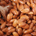 Maple Glazed Almonds in a bowl before baking.