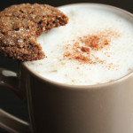 A thumbnail image showing a mug of gingerbread latte with a bitten gingerbread cookie balancing on the top of the mug.