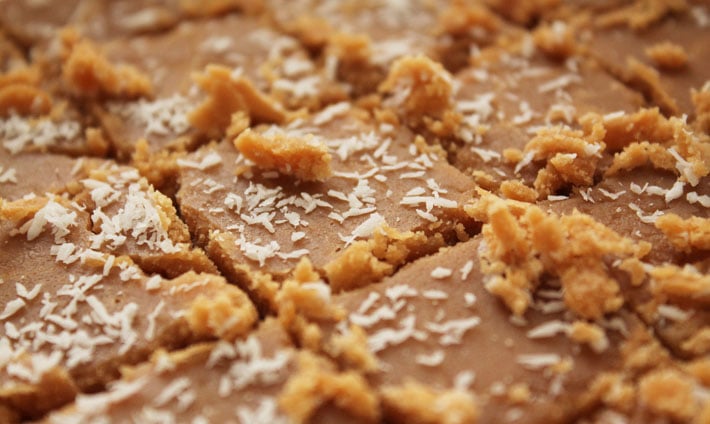 Up close shot of Vegan Coconut Fudge after it was just sliced into squares.