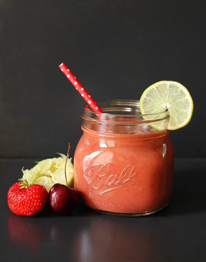 A Cherry Berry Coconut Limeade Smoothie is just what you need to cool down on a hot summer's day! Loaded with berries, cherries, and tart lime juice.