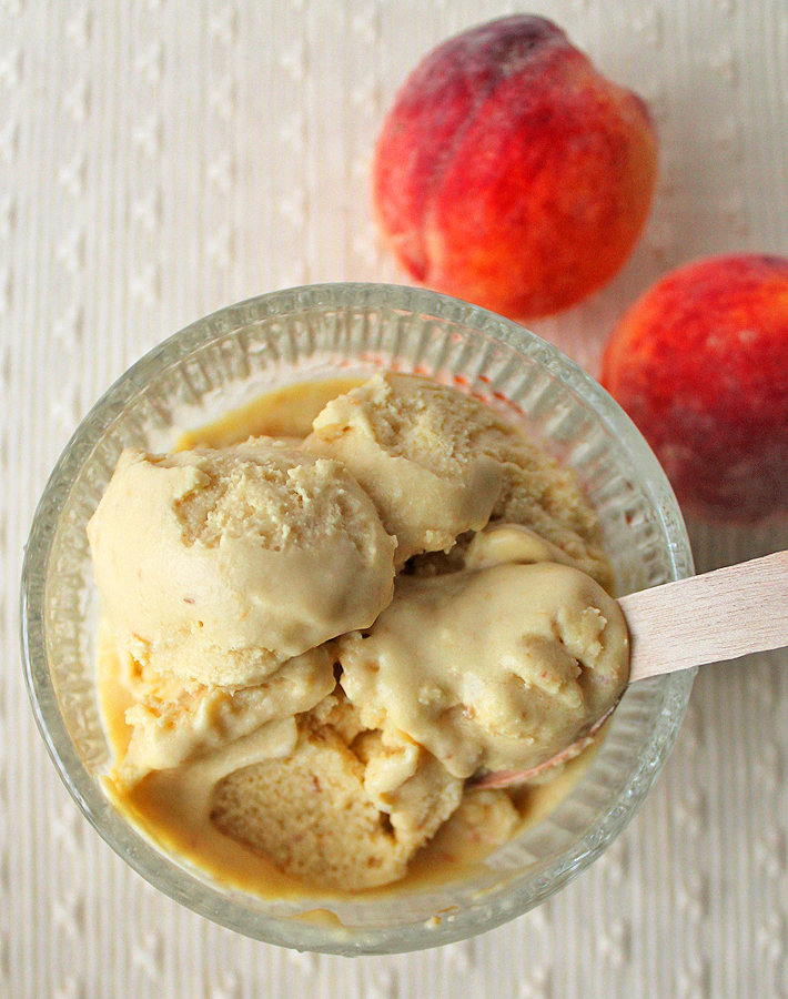 Break our your ice cream machine and make a batch of this vegan Coconut Peach Ice Cream to cool down during the hot summer days.