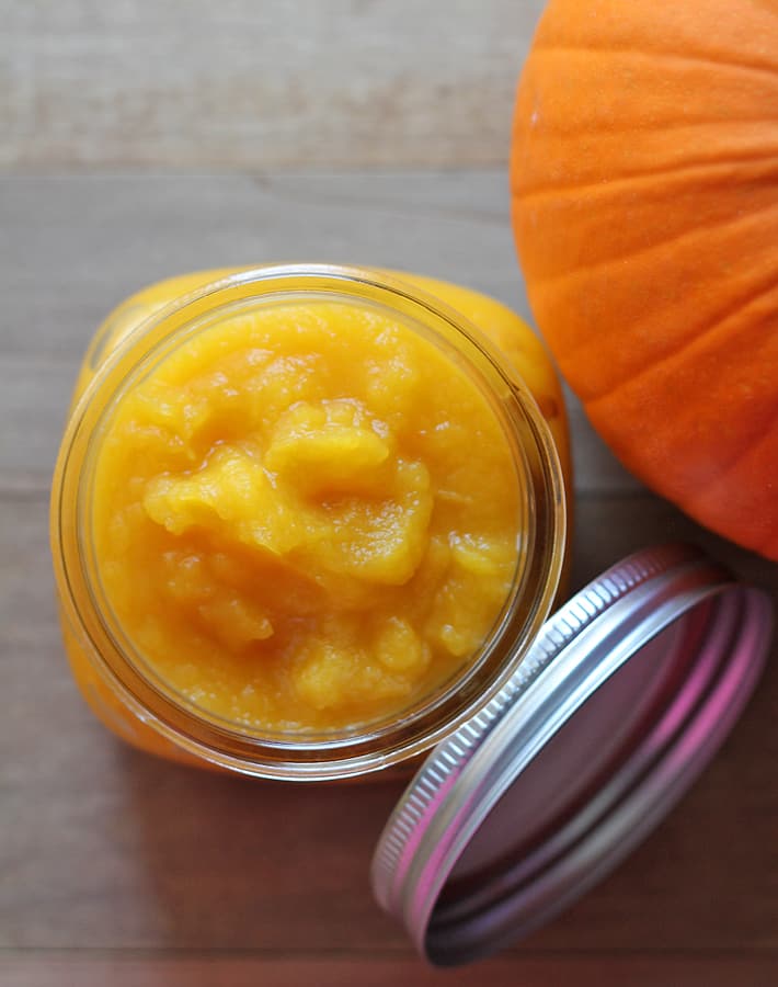 How to Make Homemade Pumpkin Puree - Overhead shot of finished pumpkin puree in a mason jar.