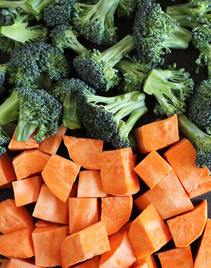 These Sweet Potato Broccoli Chickpea Bowls are filled with nutritious ingredients and topped with a delicious garlic tahini sauce you'll love.