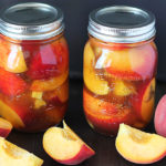 Prolong summer peach season by making this recipe for Easy Refrigerator Pickled Peaches. They're tangy, sweet, spicy, and delicious!