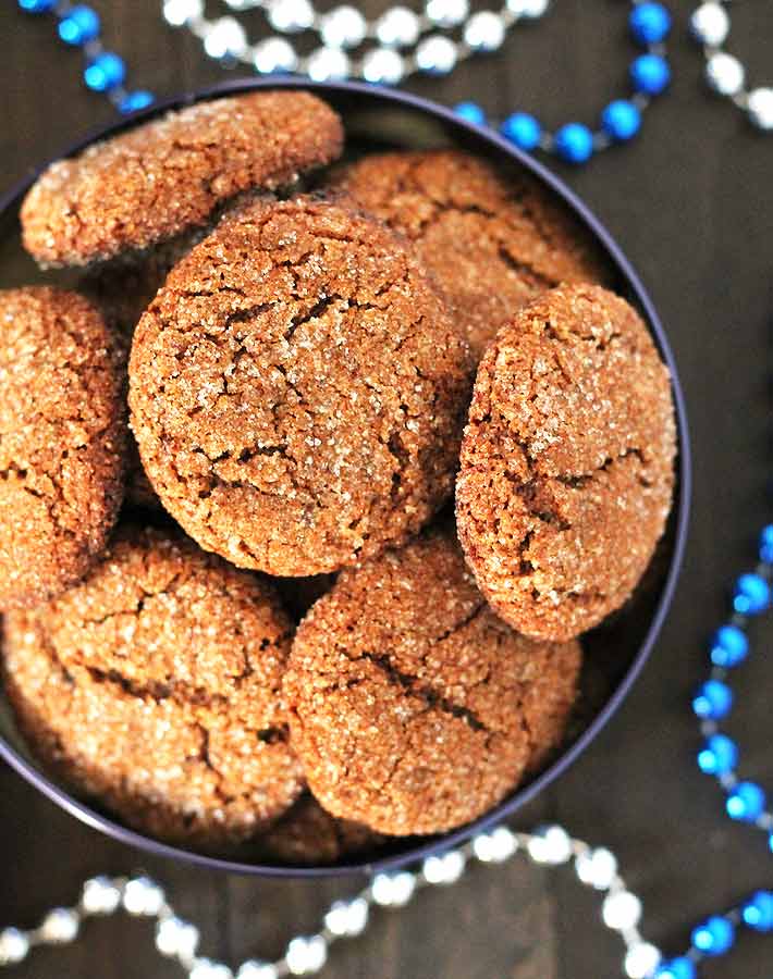 Overhead shot of a tin of Christmas Vegan Gluten Free Gingerbread Cookies.