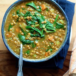 Easy Instant Pot Vegan Recipes - Overhead shot of a bowl of Instant Pot Golden Lentil and Spinach Soup.