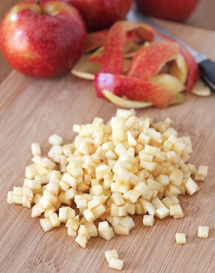 Chopped apples to add to the batter for Gluten Free Vegan Apple Muffins.