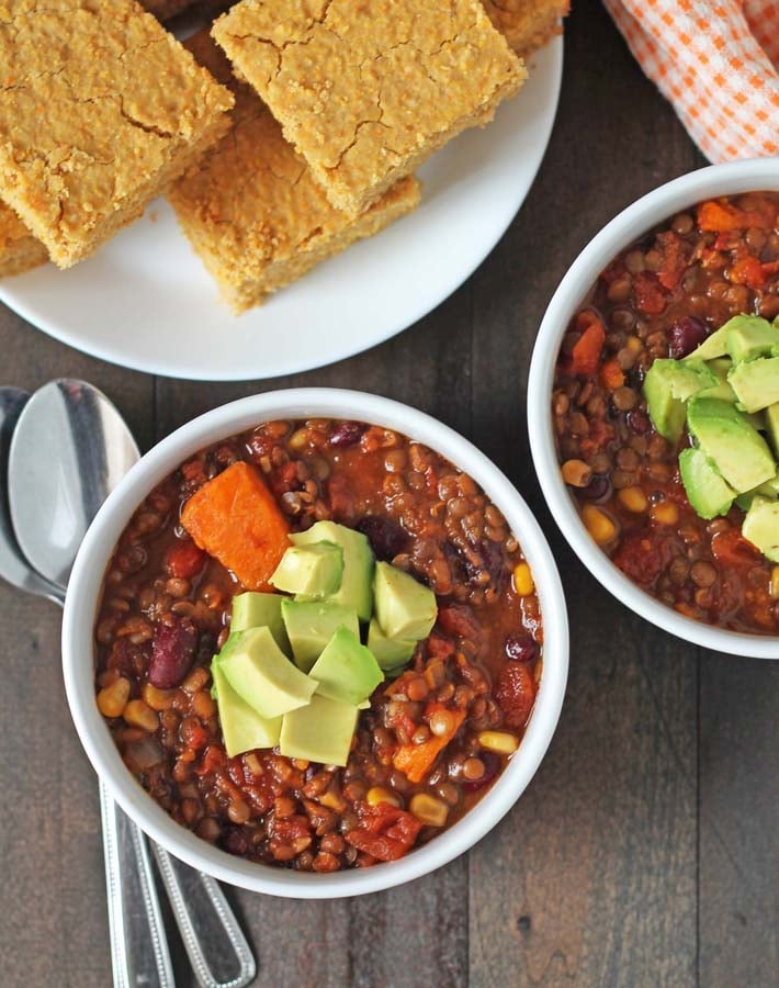 Overhead shot of Lentil Sweet Potato Chili in two white bowls.