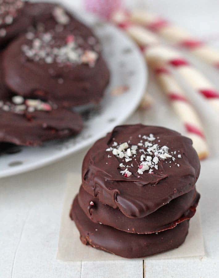 A stack of three Vegan Peppermint Patties on top of each other.