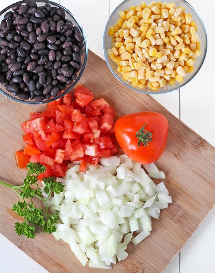 Overhead picture of some of the ingredients needed for Taco Rice Bowls.