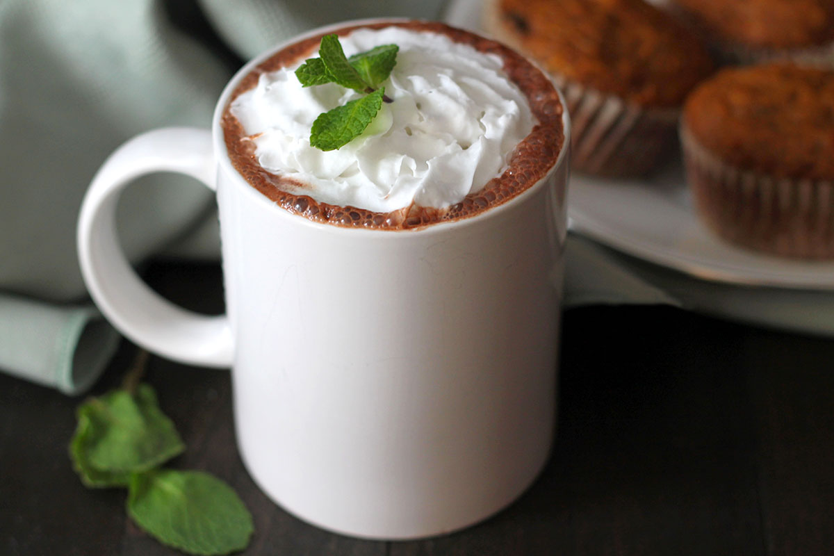 Close up shot of Vegan Peppermint Hot Chocolate in a white mug.