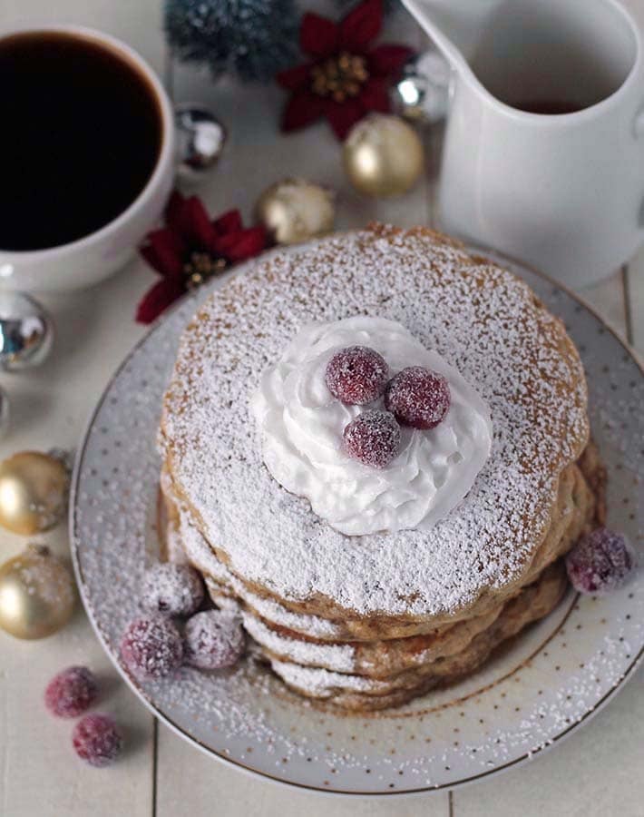 Overhead shot of a plate of eggnog pancakes.