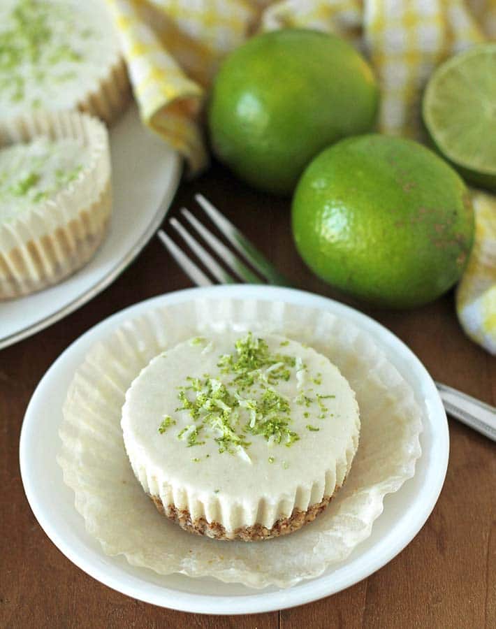 Vegan Lime Cheesecake with warpper removed, cheesecake is sitting on the wrapper.