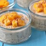 Coconut Mango Chia Pudding Cups on a table.