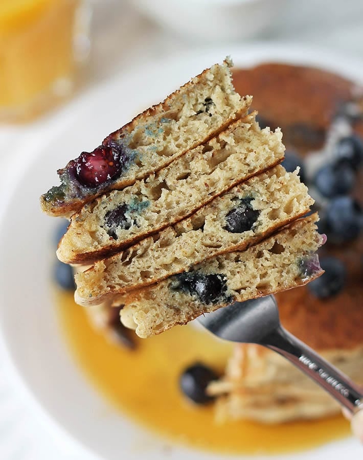 Gluten free dairy free pancakes on a fork.