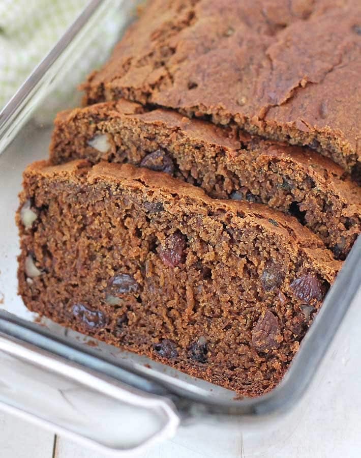 Sliced egg free zucchini bread in a glass dish.