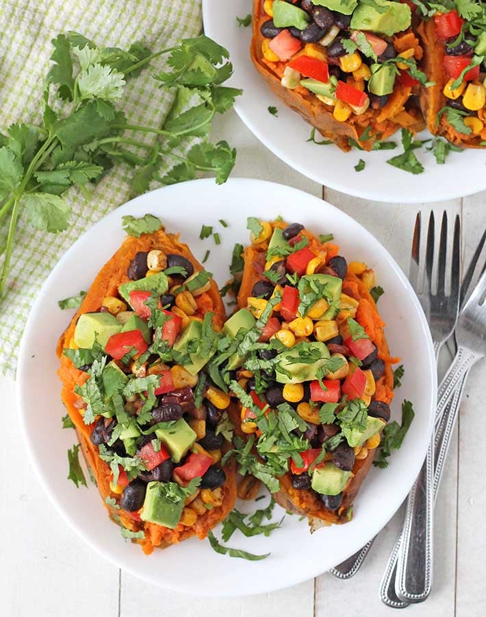 Overhead shot of a plate of vegan stuffed sweet potatoes.