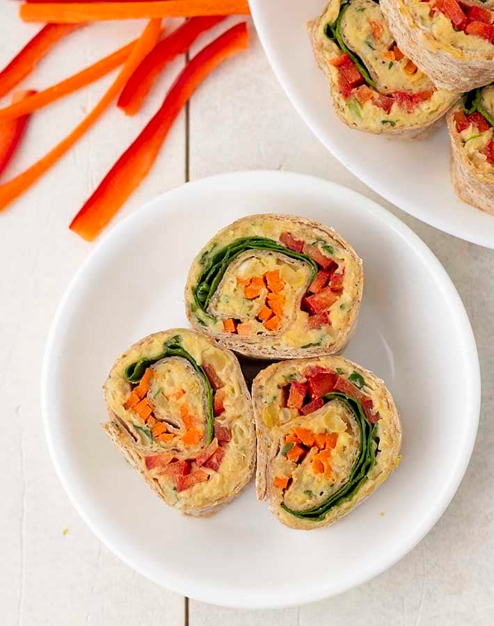 Overhead shot of easy pinwheel appetizers on a plate.