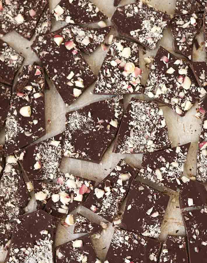 Pieces of Christmas chocolate peppermint bark on a tray.