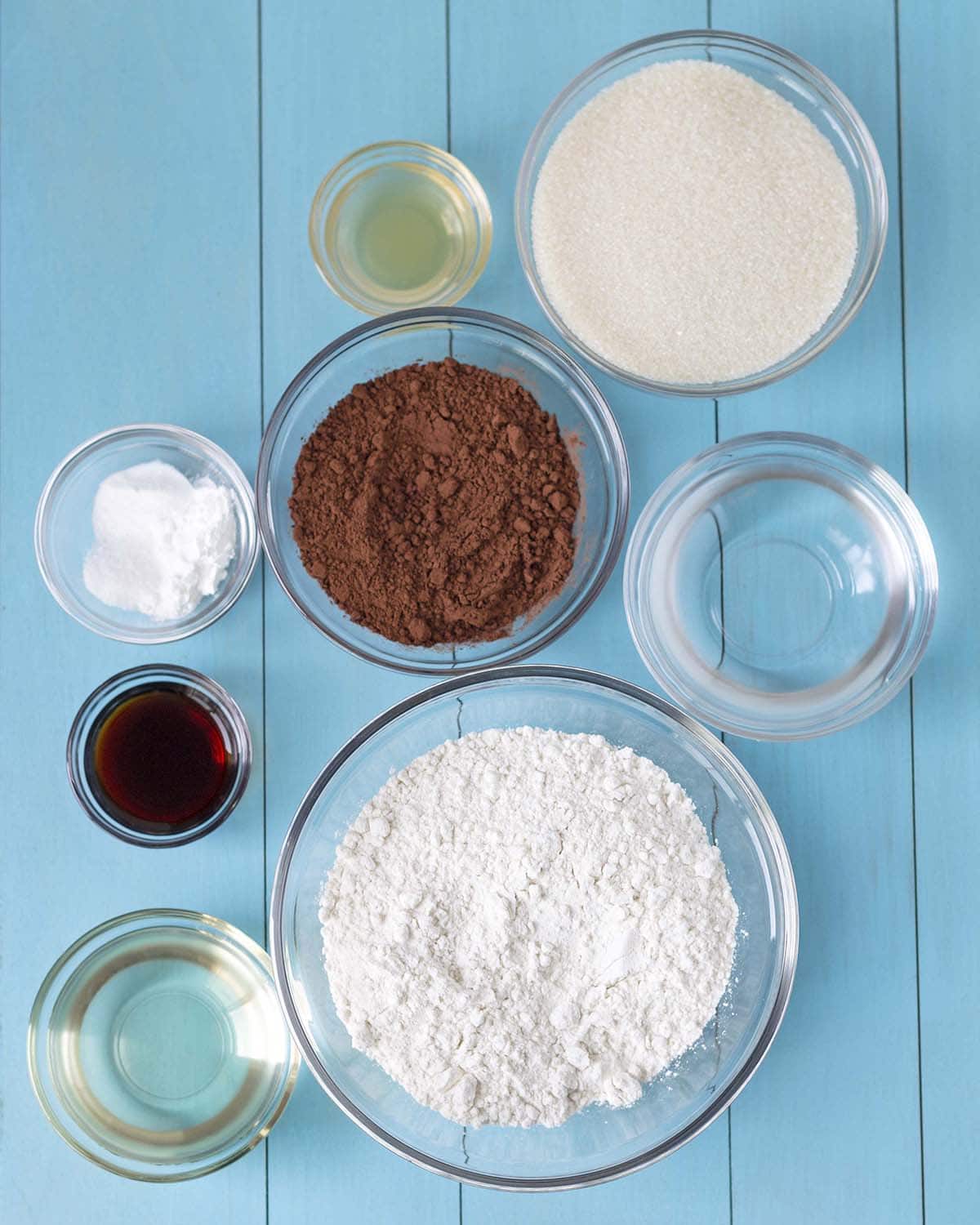 An overhead shot of the ingredients needed to make gluten free chocolate cupcakes.