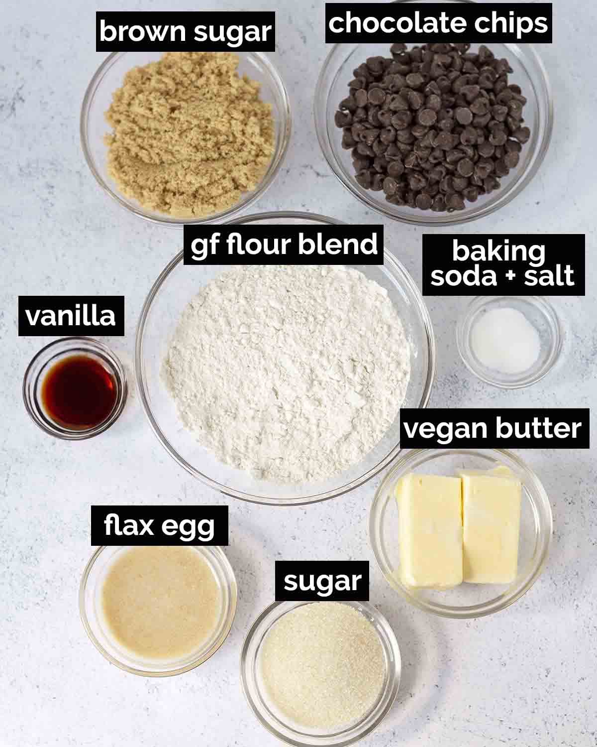 An overhead shot showing all of the ingredients needed to make homemade gluten free chocolate chip cookies.
