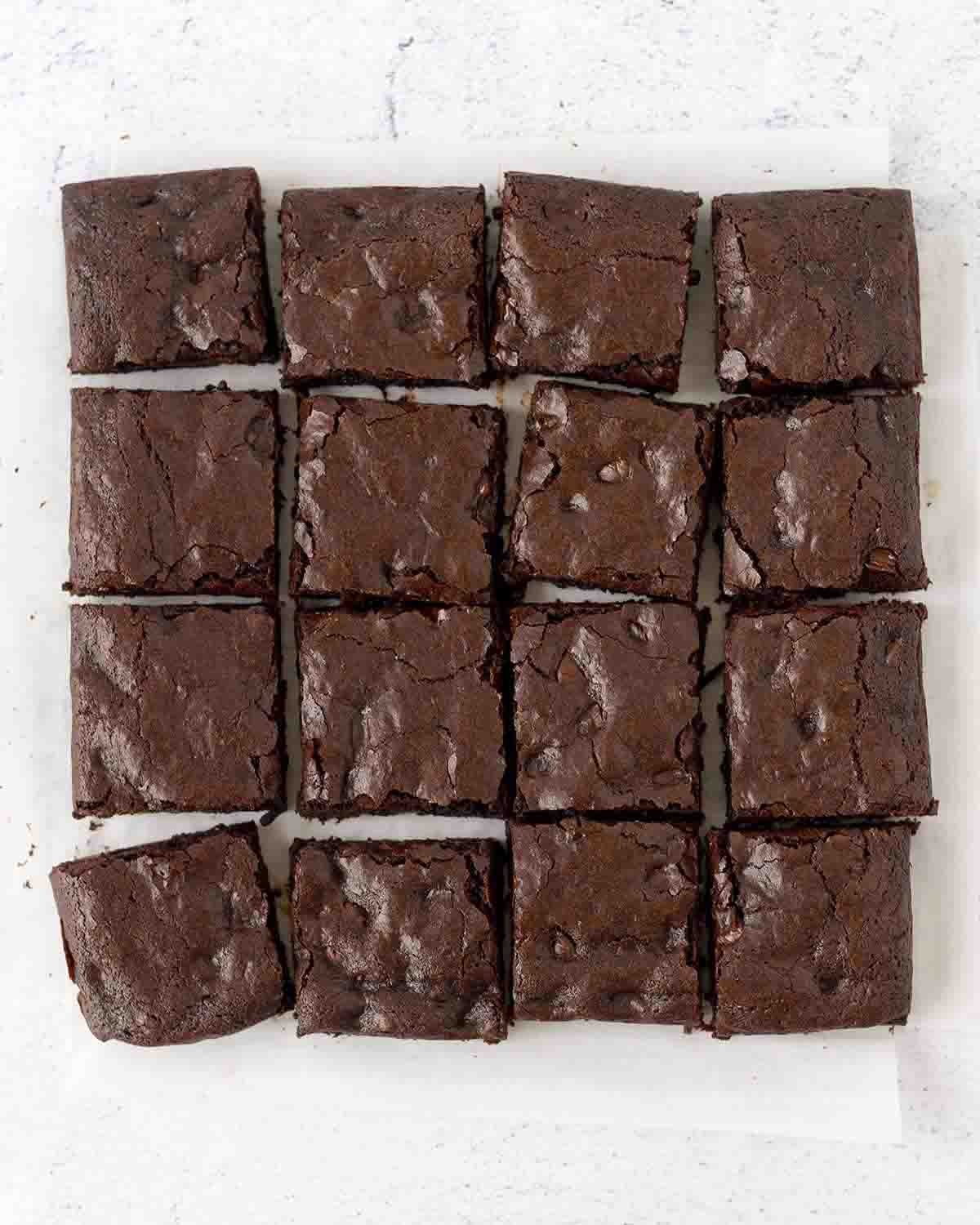An overhead shot showing gf brownies sliced into squares.