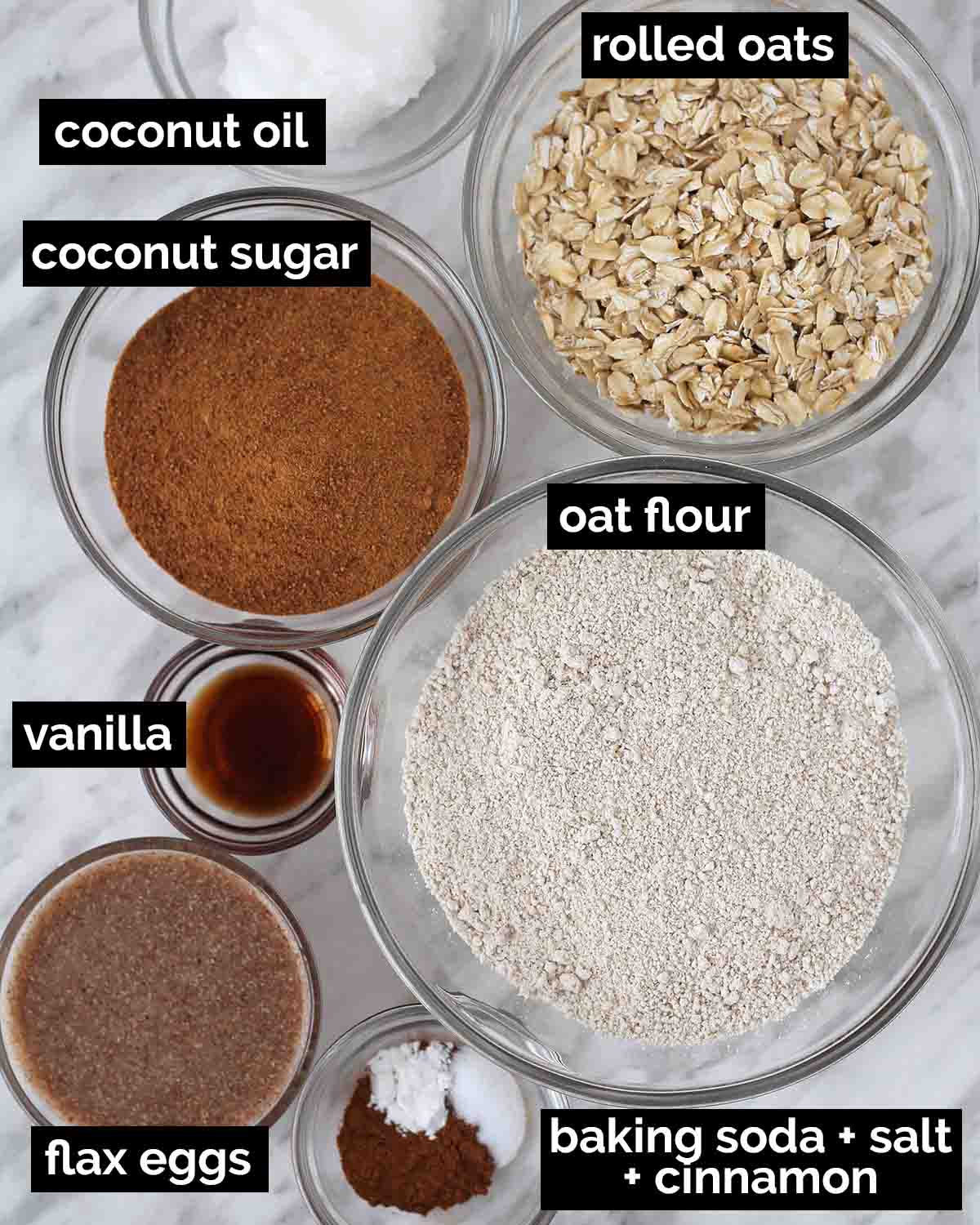 An overhead shot showing the ingredients needed to make dairy-free oatmeal cookies.