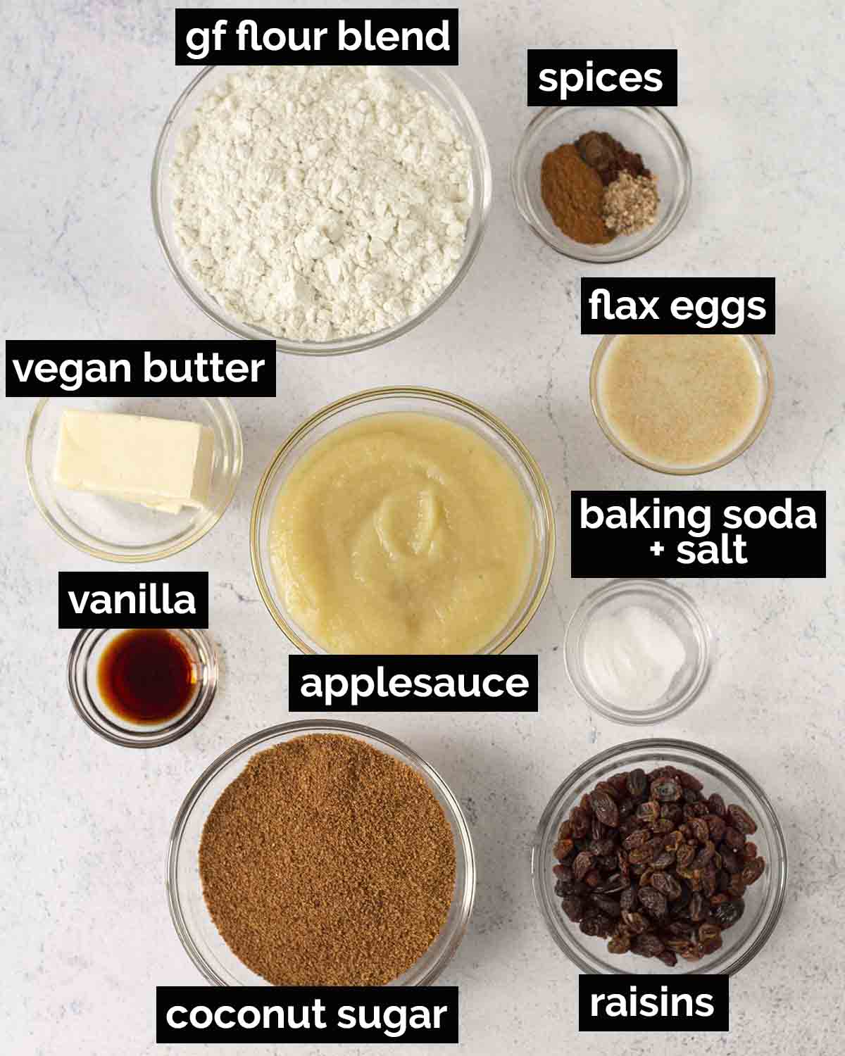 An overhead shot showing all the ingredients needed to make homemade vegan gluten-free applesauce cake.
