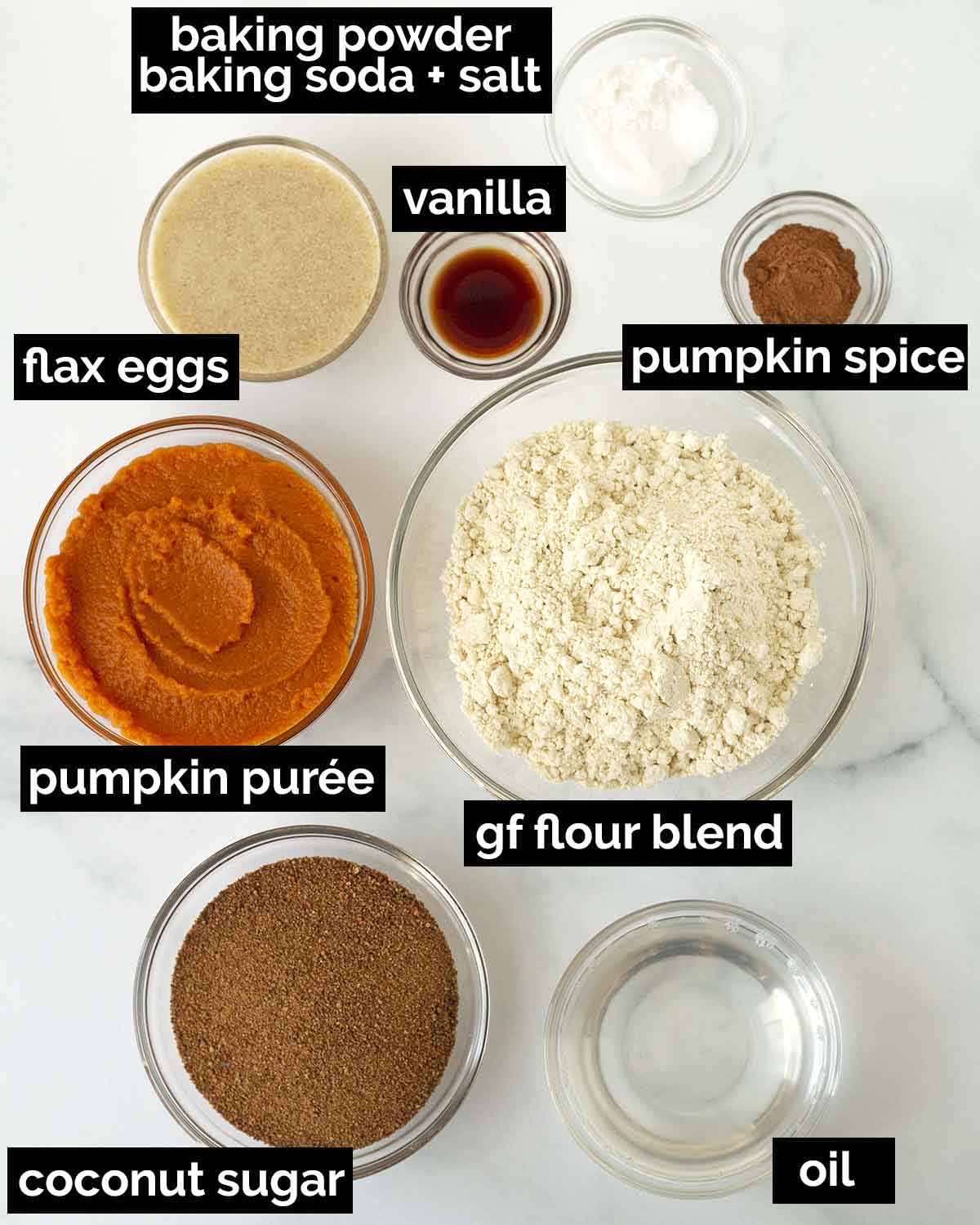 An overhead shot showing the ingredients needed to make gluten free dairy free pumpkin cupcakes.