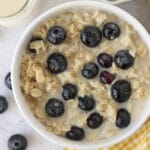 An overhead shot showing blueberry oatmeal in a bowl.