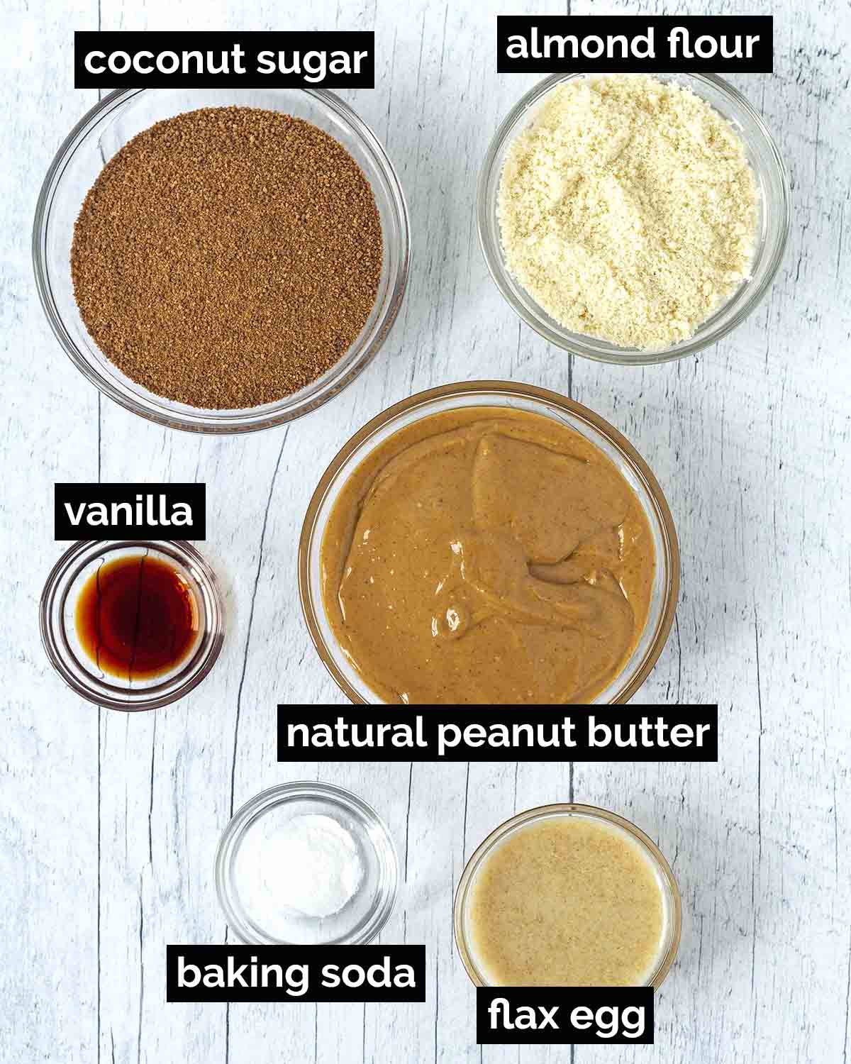 An overhead shot showing the ingredients needed to make vegan almond flour peanut butter cookies.