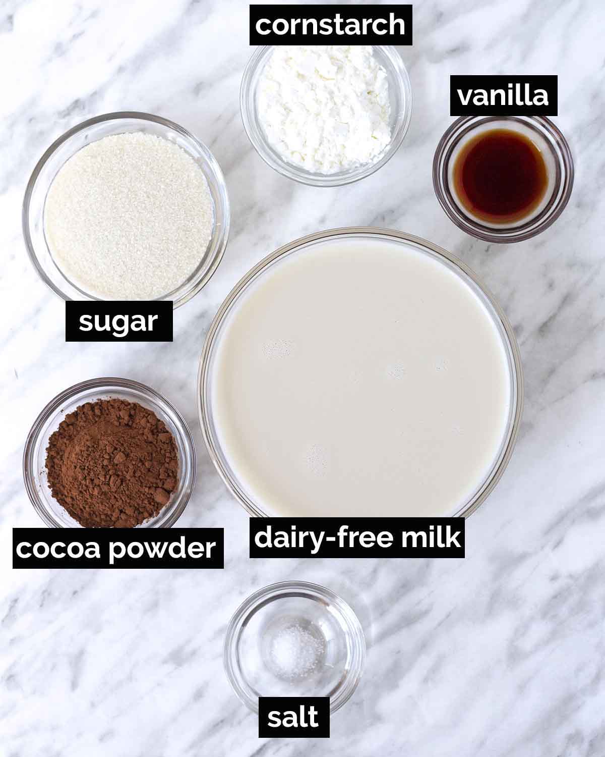 An overhead shot showing the ingredients needed to make vegan vegan chocolate pudding.