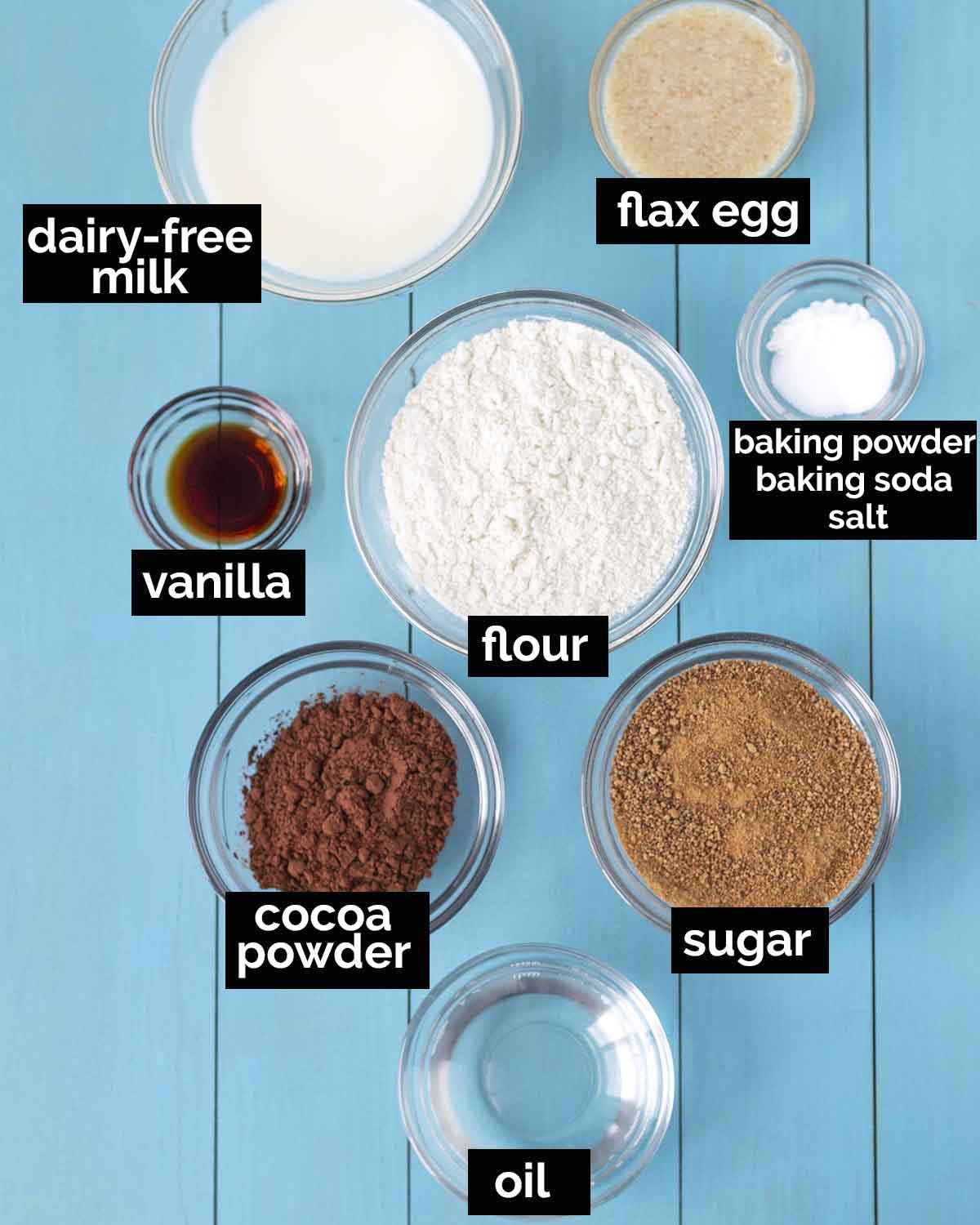 An overhead shot showing the ingredients needed to make vegan chocolate donuts.