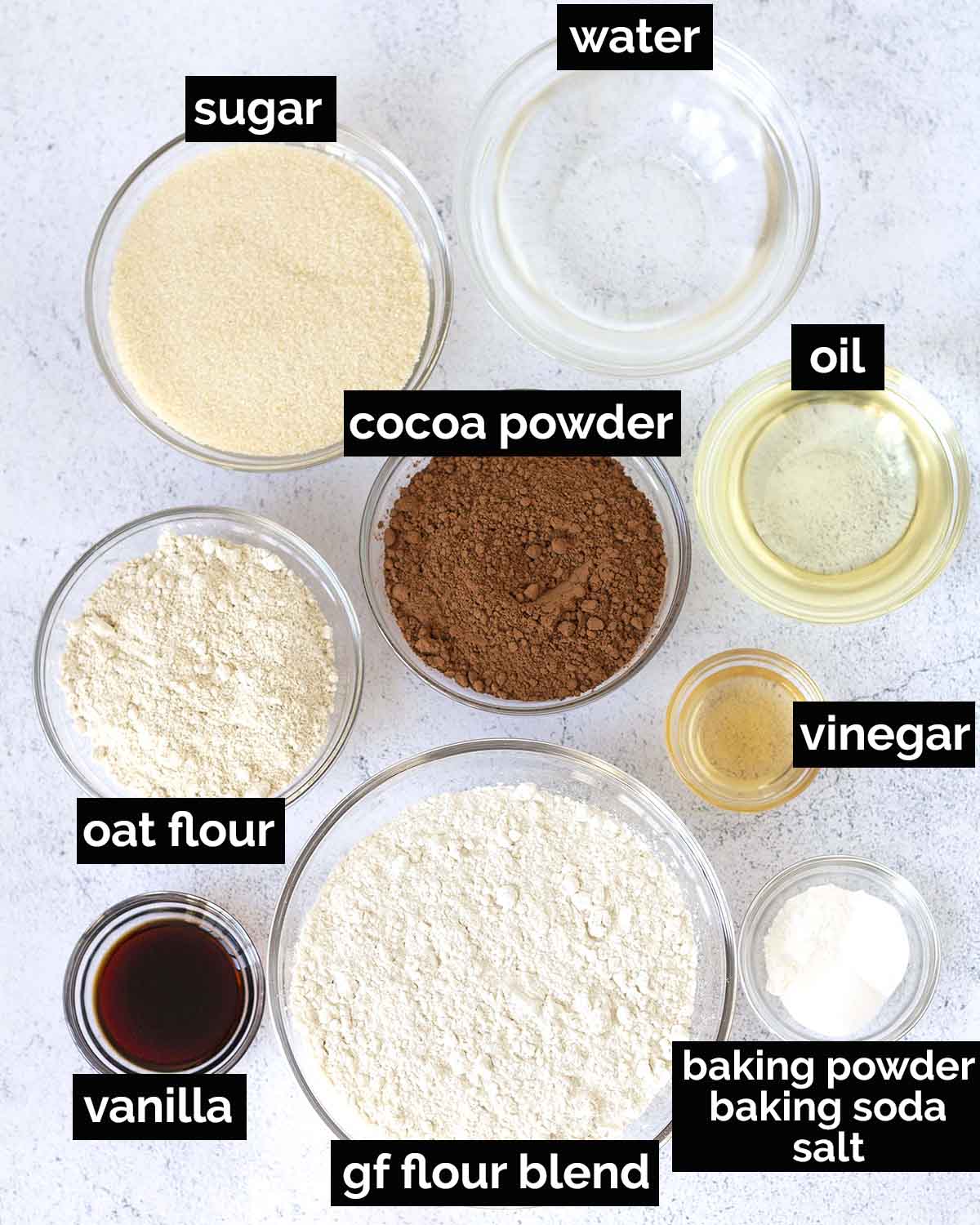 An overhead shot showing the ingredients needed to make vegan gluten-free chocolate cake.