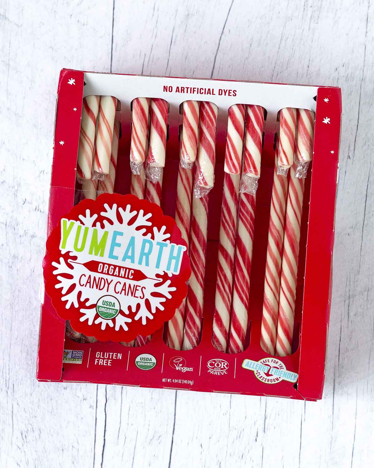 An overhead shot of a box of YumEarth vegan candy canes.