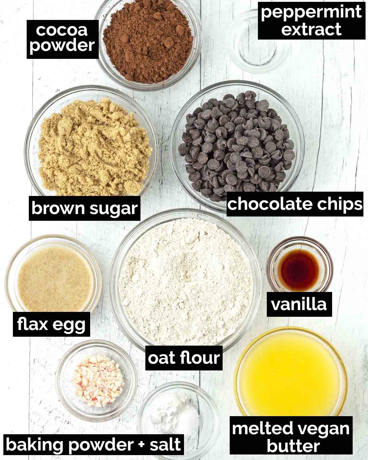 An overhead shot showing the ingredients needed to make vegan mint chocolate chip cookies.