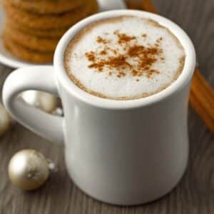 A close up shot of a mug filled with a gingerbread latte.