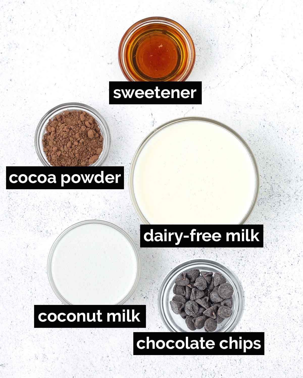 An overhead shot showing the ingredients needed to make vegan hot chocolate.