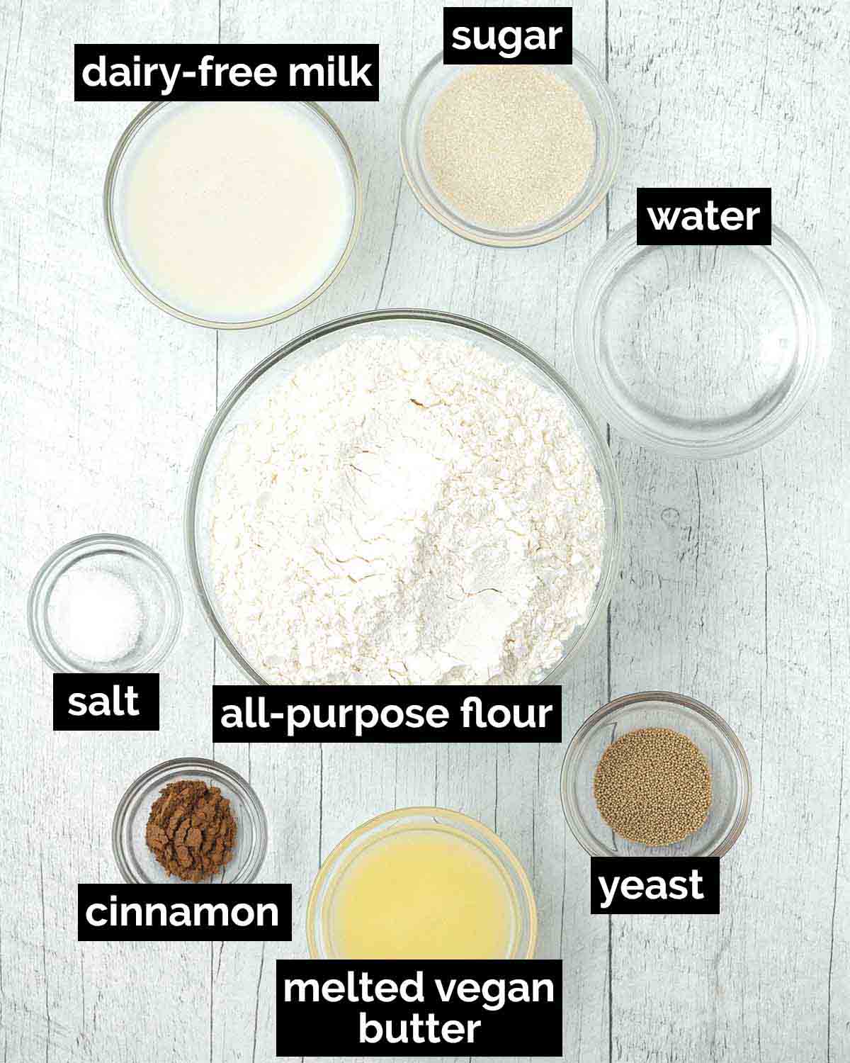 An overhead shot showing the ingredients needed to make vegan cinnamon rolls.