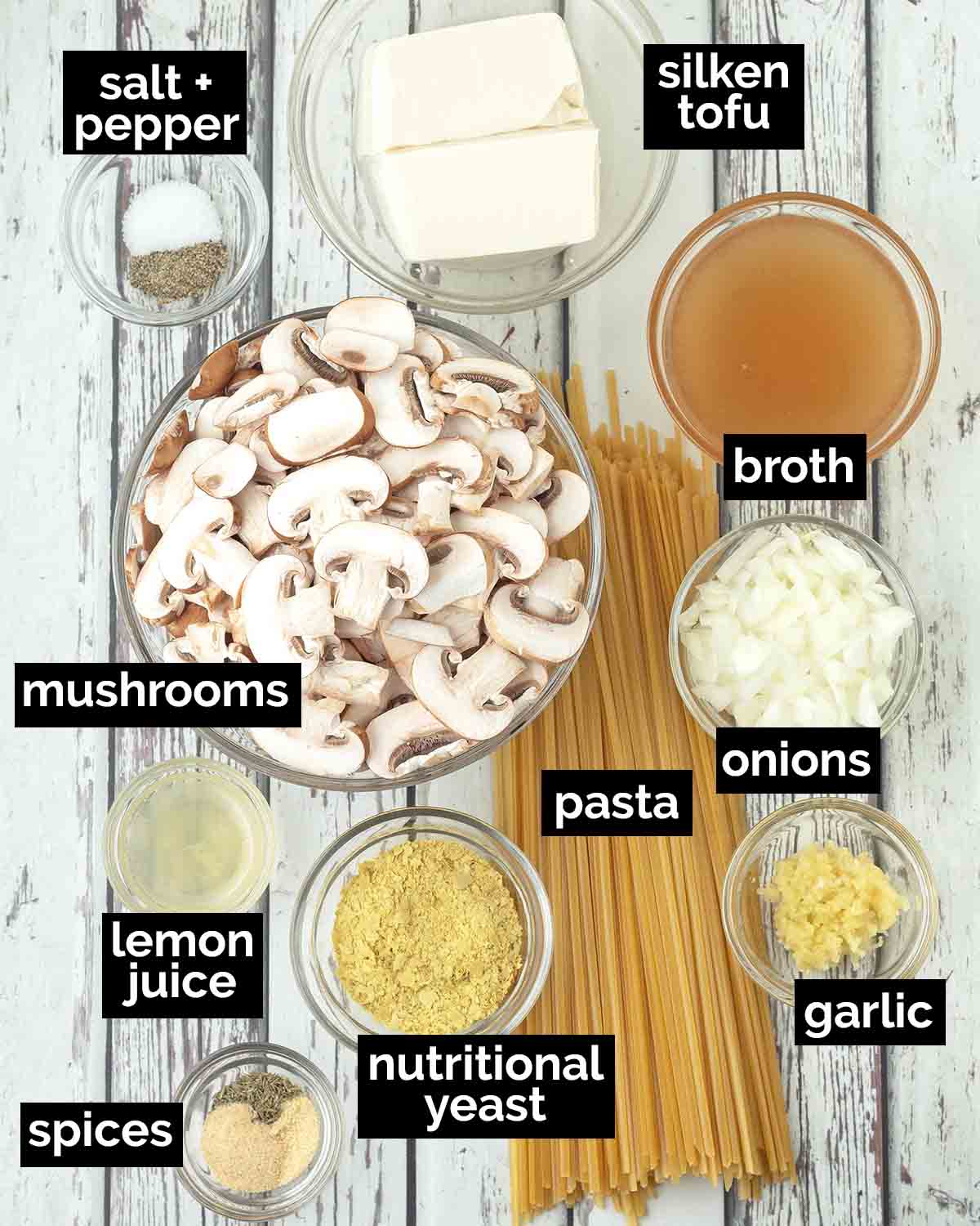 An overhead shot showing the ingredients needed to make vegan mushroom pasta.
