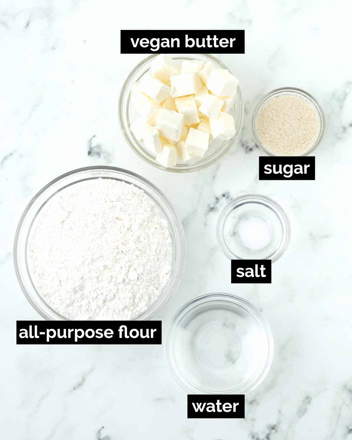 An overhead shot showing the ingredients needed to make vegan pie crust.