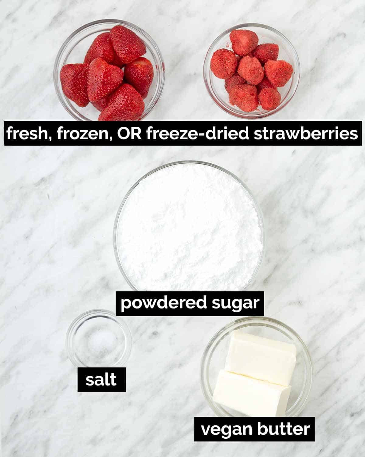 An overhead shot showing the ingredients needed to make vegan strawberry frosting.