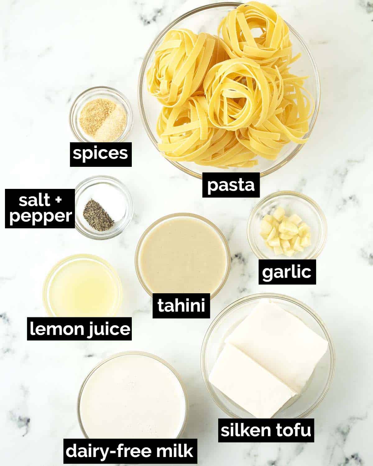 An overhead shot showing the ingredients needed to make tahini pasta.
