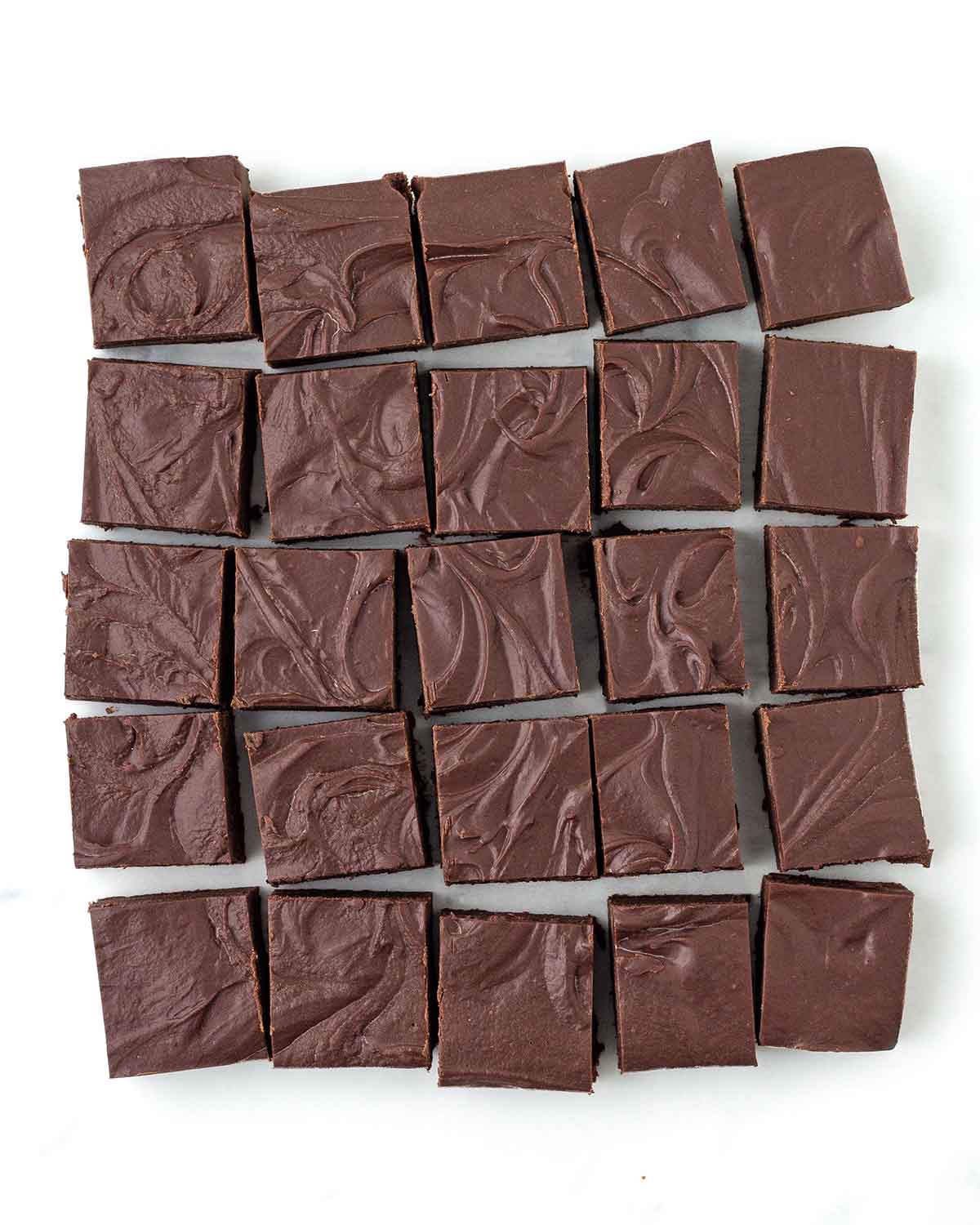 An overhead image of sliced squares of dairy-free fudge.