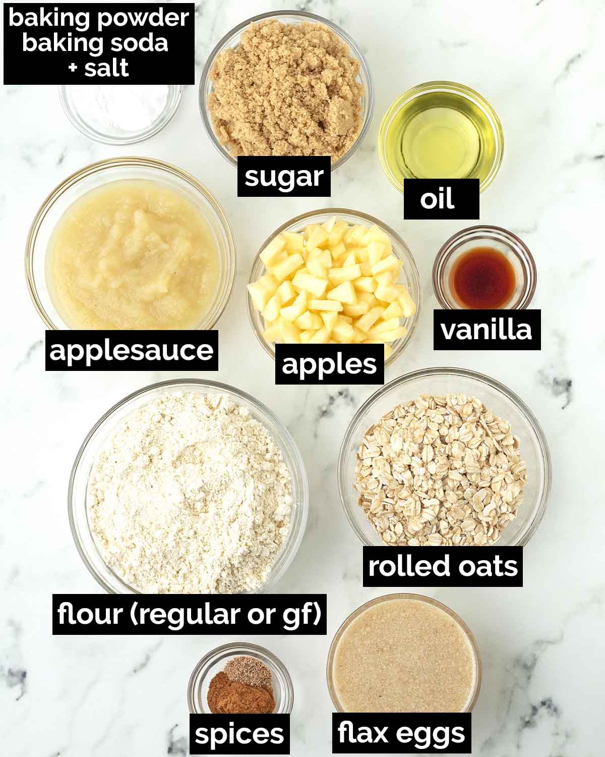 An overhead shot showing the ingredients needed to make vegan apple oatmeal muffins.