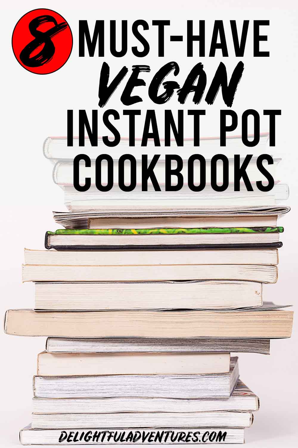 A stack on books on a table, a text overlay over the books says 8 must-have vegan Instant Pot cookbooks.