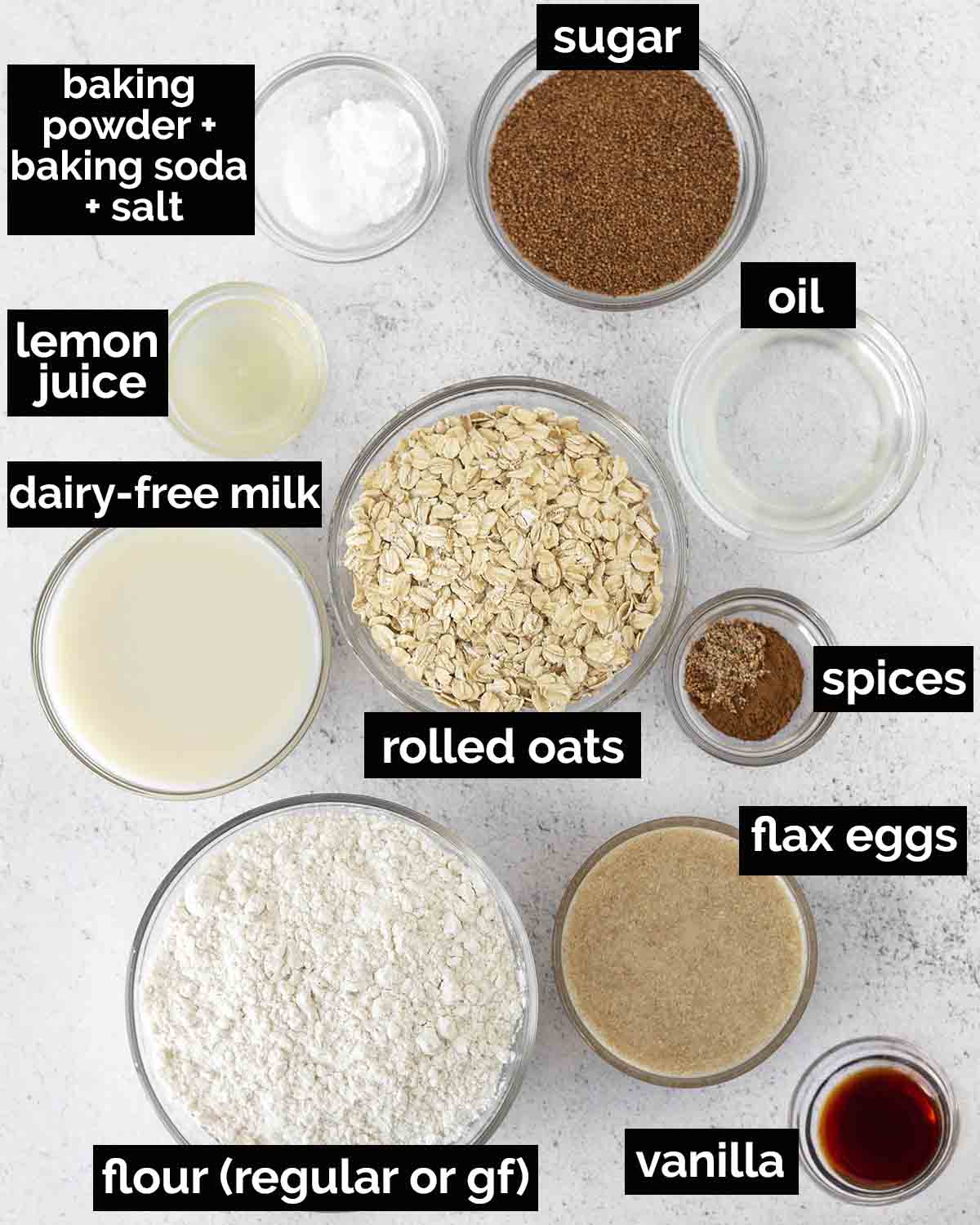 An overhead shot showing the ingredients needed to make vegan oatmeal muffins.