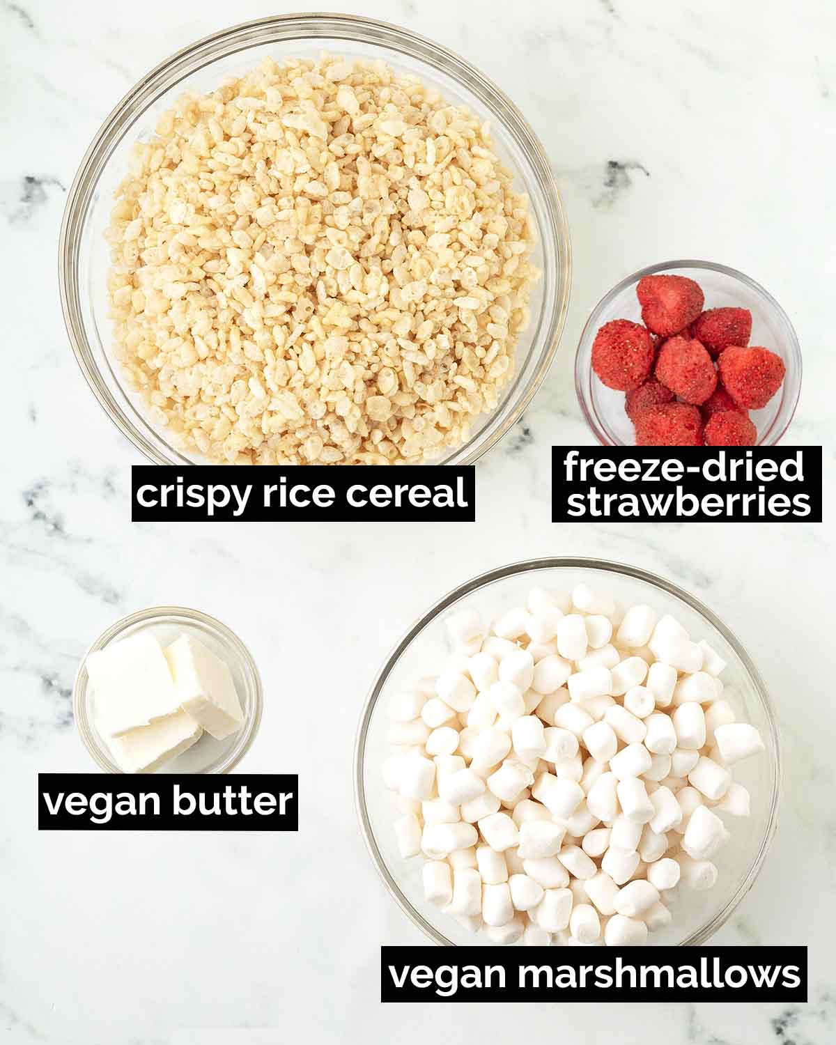 An overhead shot showing the ingredients needed to make vegan strawberry rice crispy treats.