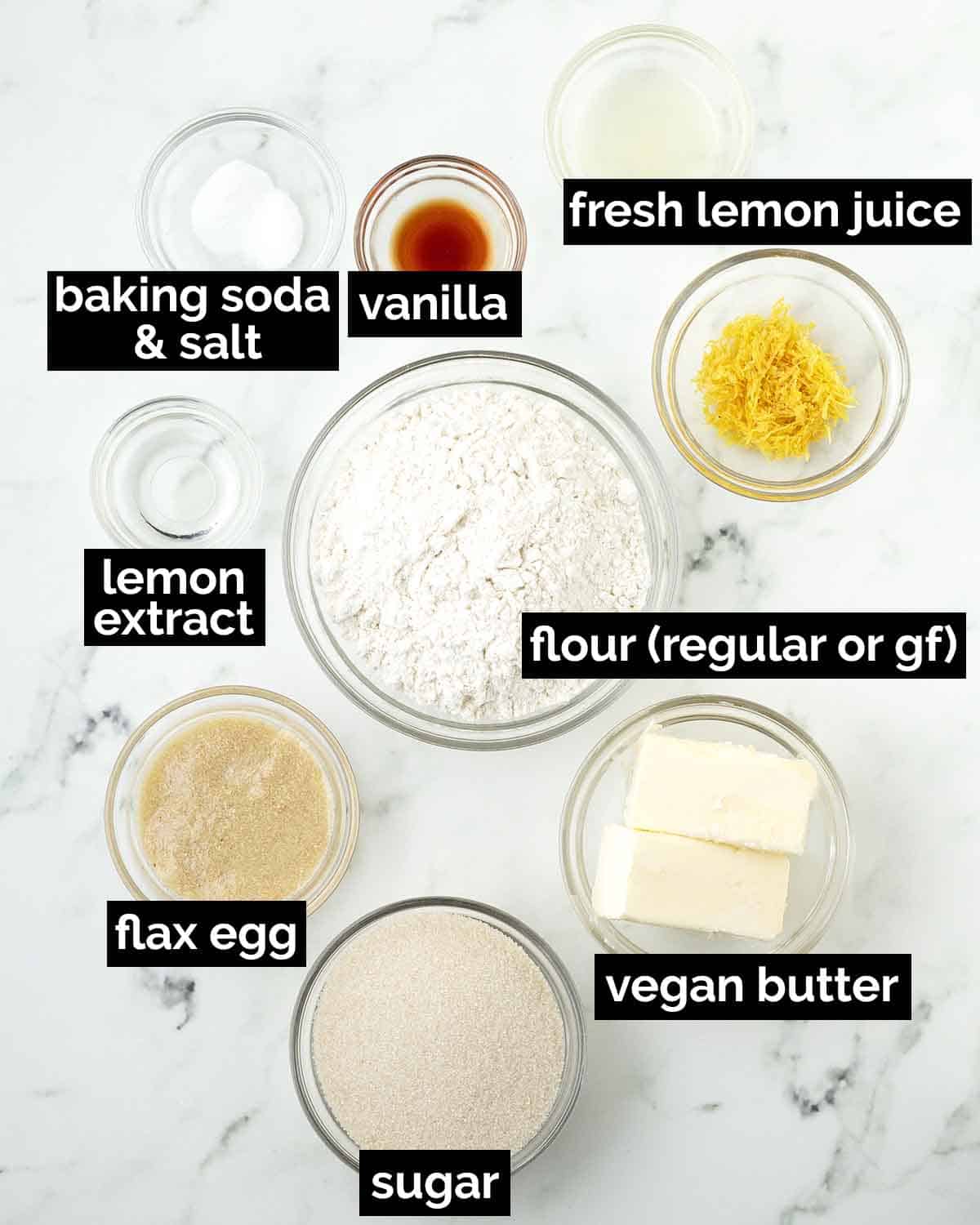 An overhead shot showing the ingredients needed to make vegan lemon cookies.