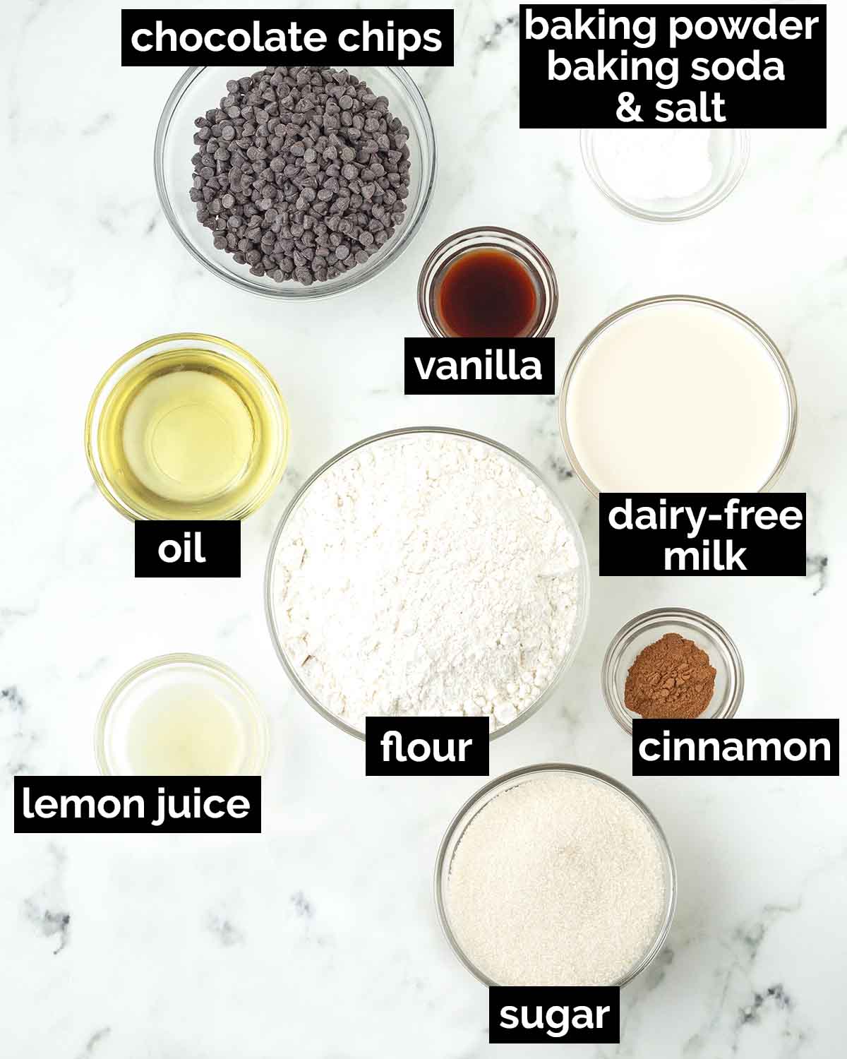 An overhead shot showing the ingredients needed to make vegan chocolate chip muffins.